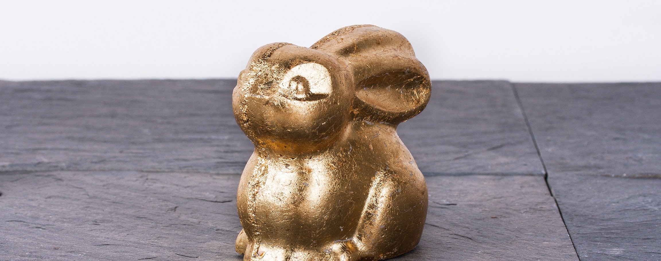 Golden rabbit out of creative-cement