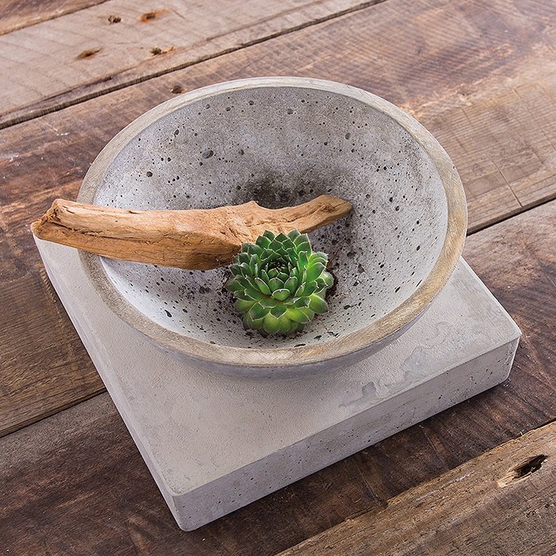 Bowl out of concrete on a plinth
