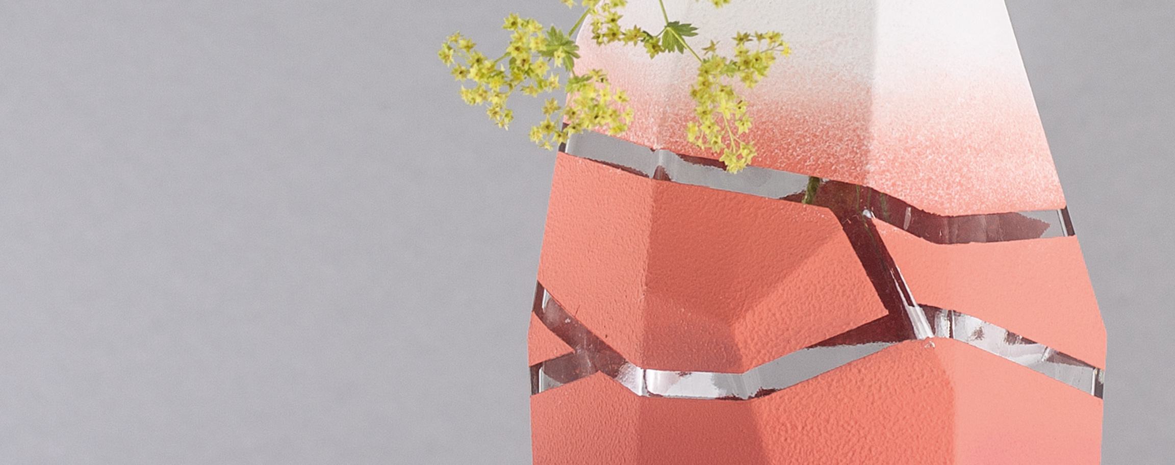 Faceted glass vase with stripes