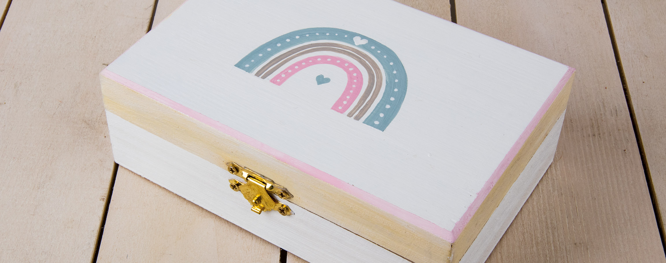 Wooden casket with rainbow