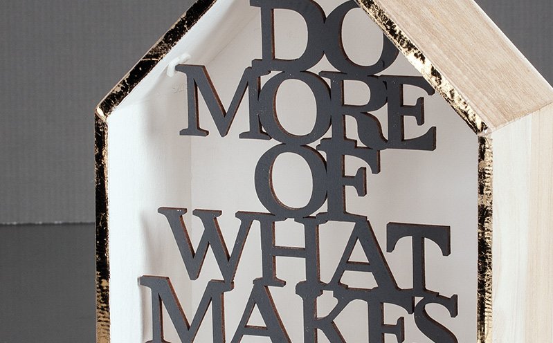 Holzhaus „Do more of what makes you happy“