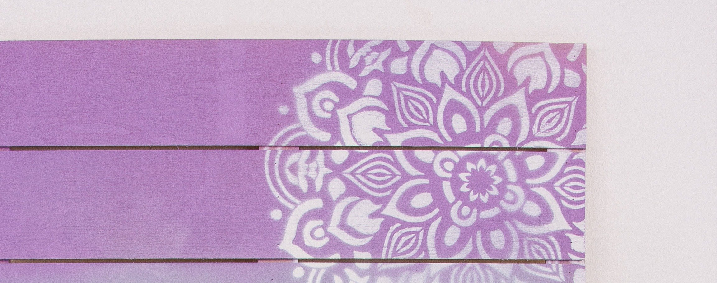 Frame out of wooden slats with Mandala