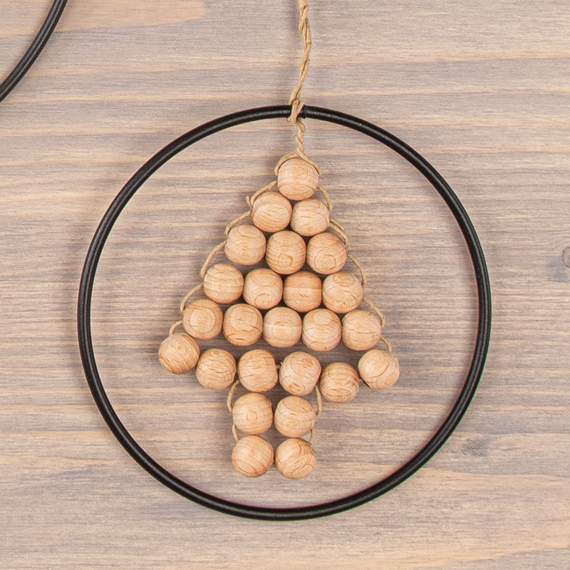 Wooden bead tree inside a metal ring