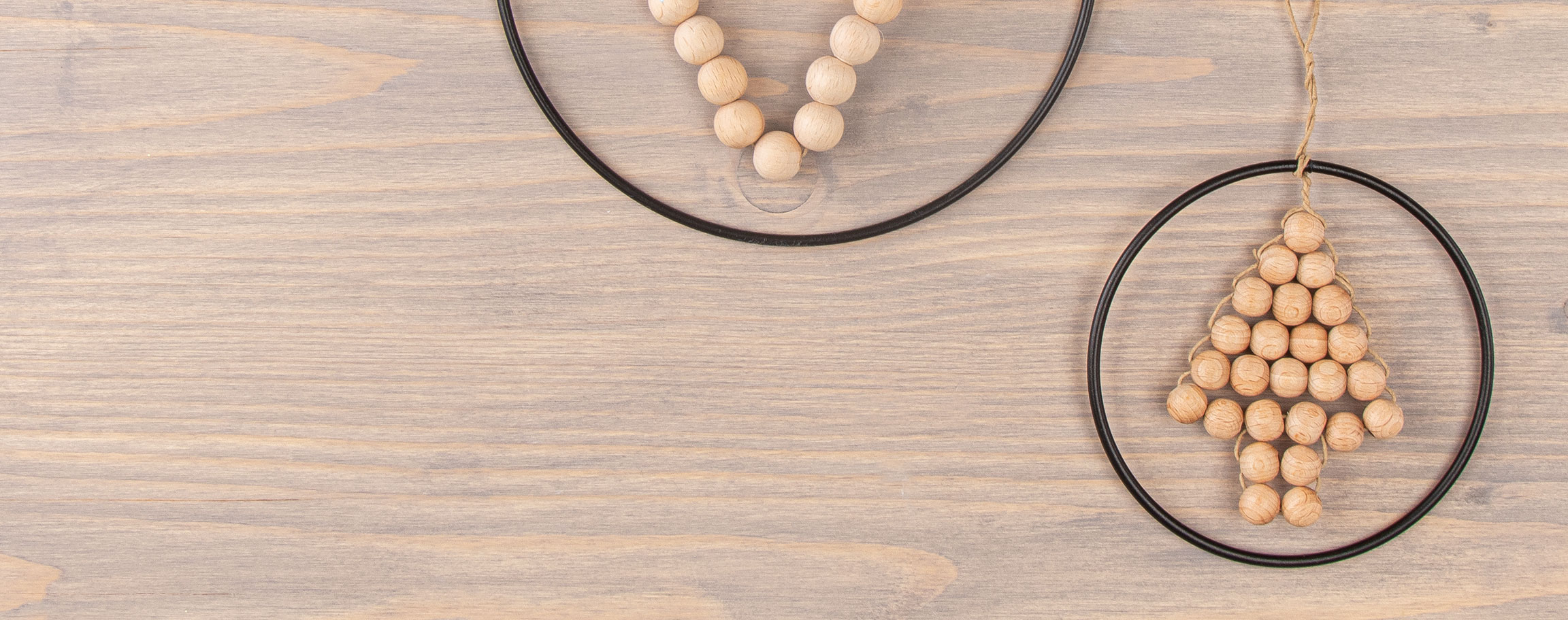 Wooden bead tree inside a metal ring