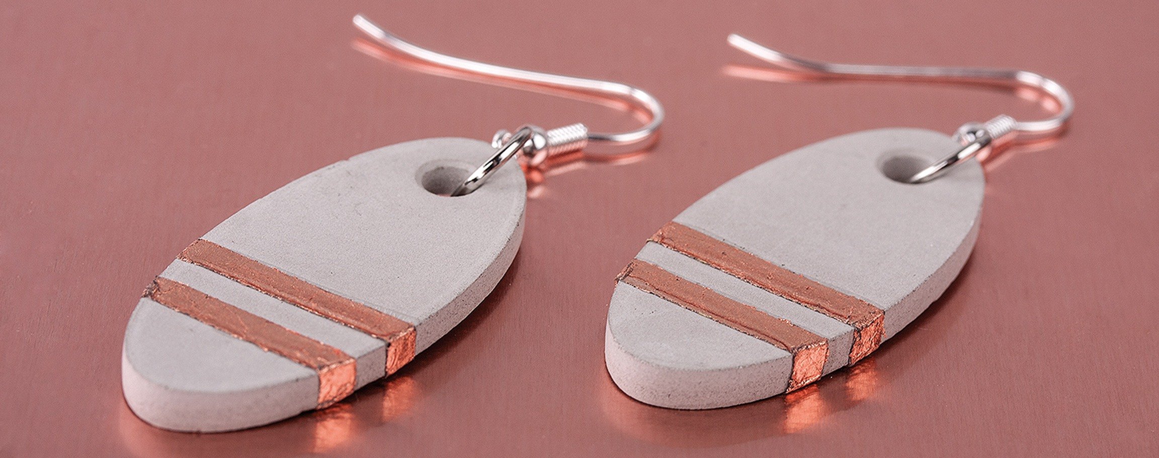 Copper-coloured oval earrings