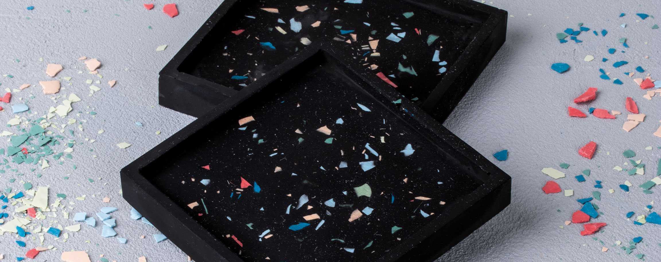 Black Raysin coaster in terrazzo look
